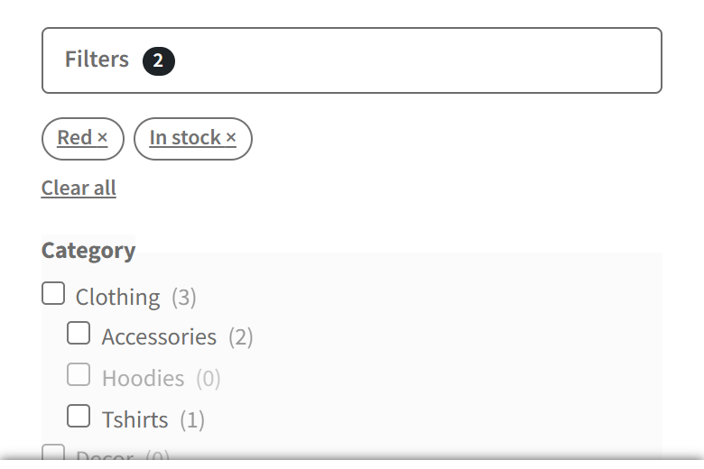 The shop on a 390 pixel wide screen: a Filters button with a badge showing 2, the chips Red and In stock, and the first category values.